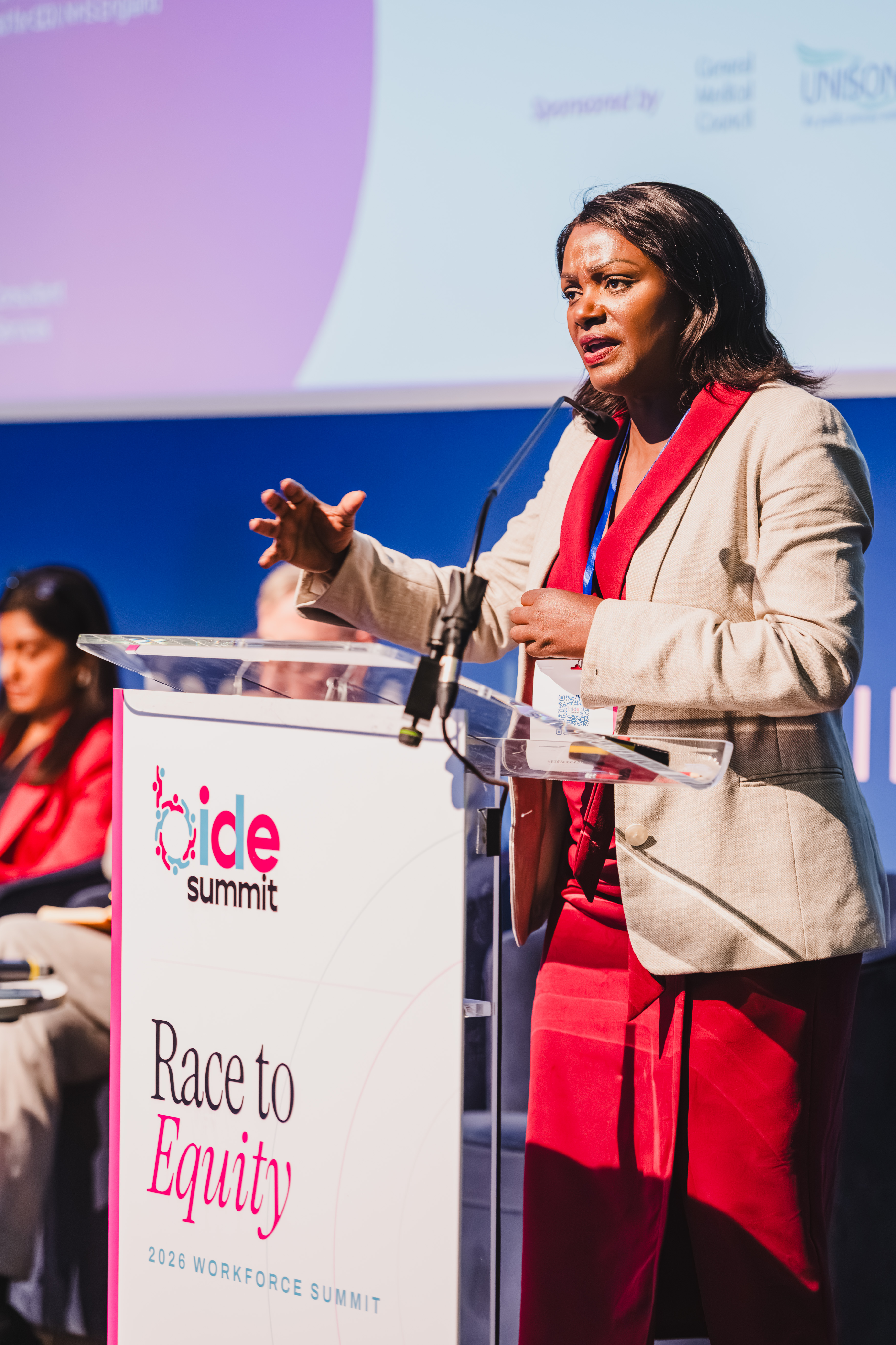 B.I.D.E Summit senior leadership panel address by speaker in cream