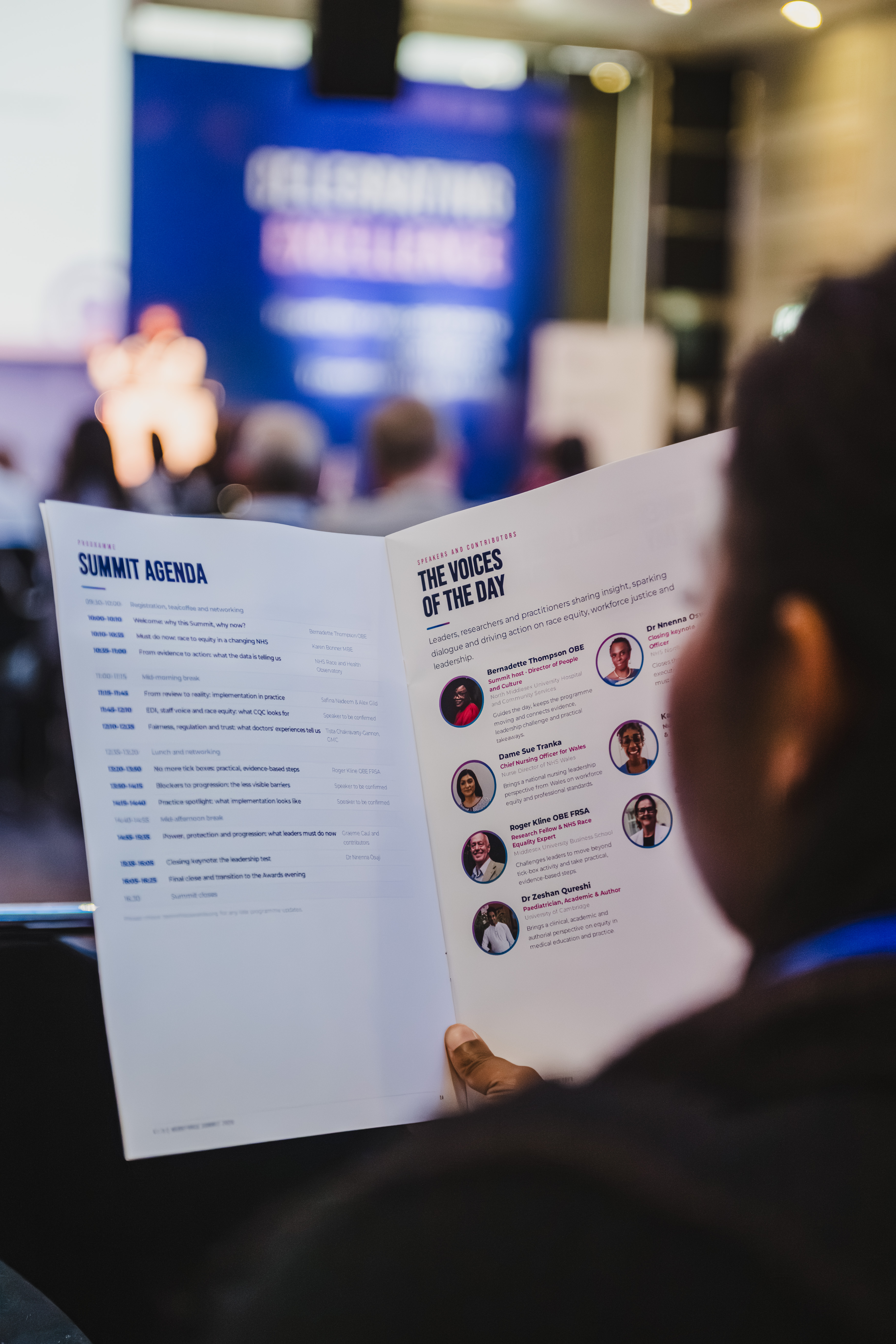 B.I.D.E summit delegate reading the summit programme