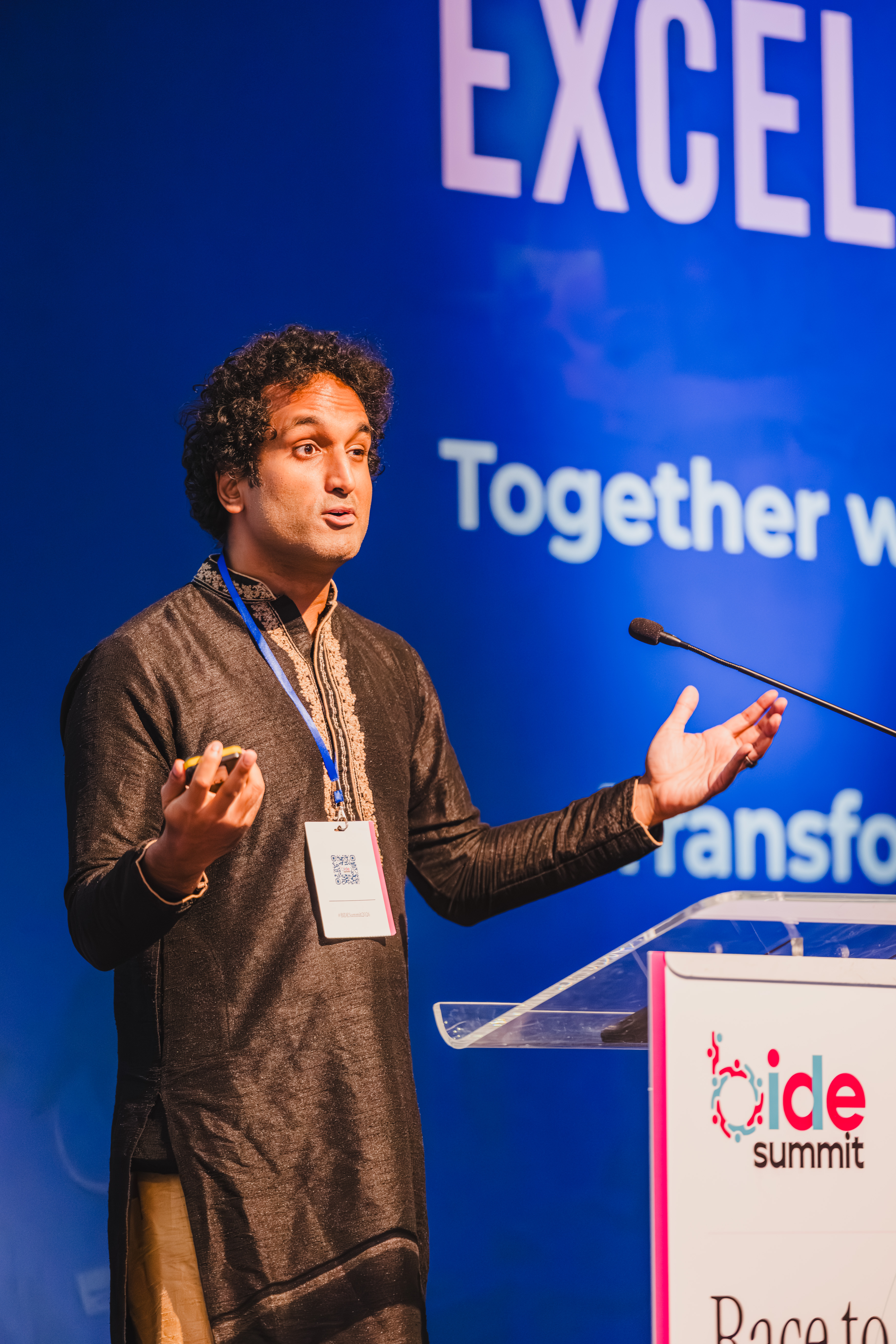 B.I.D.E summit speaker engaging the audience from the lectern